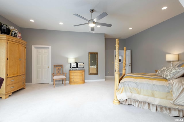 bedroom featuring ceiling fan and light carpet