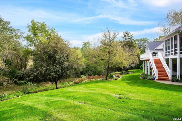 view of yard with a deck