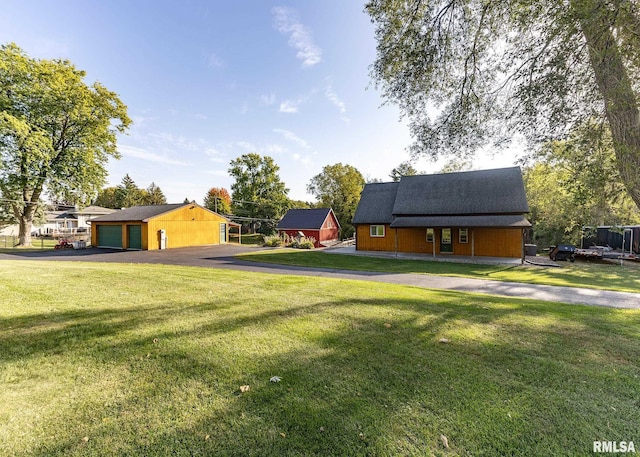 view of yard with a garage