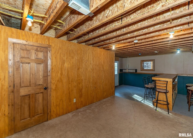 basement featuring bar area