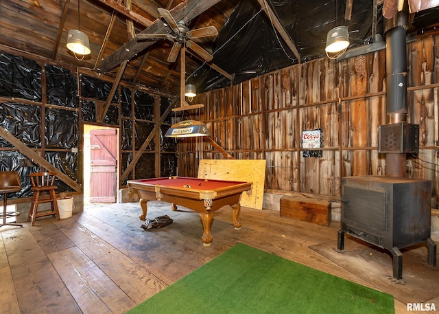 rec room with pool table, wooden walls, and hardwood / wood-style floors