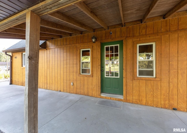 entrance to property featuring a patio area