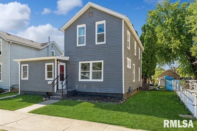 view of front property with a front yard