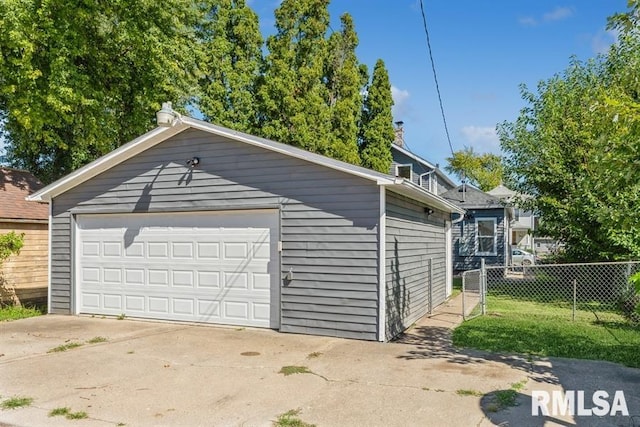 garage featuring a yard