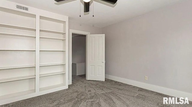 unfurnished bedroom featuring a closet, ceiling fan, and carpet floors