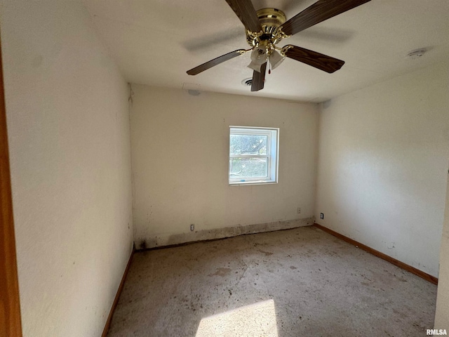 spare room with ceiling fan