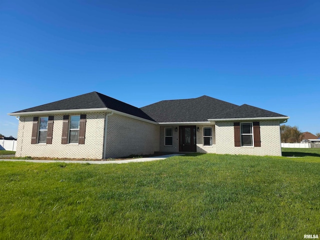 view of front of property with a front lawn