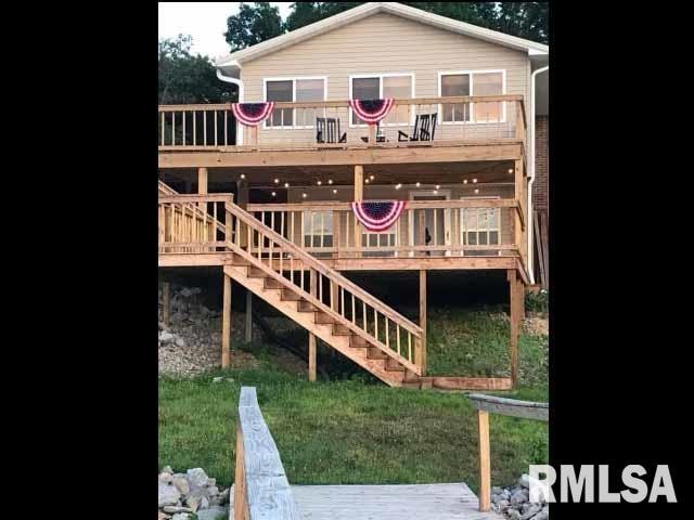 rear view of house with a deck