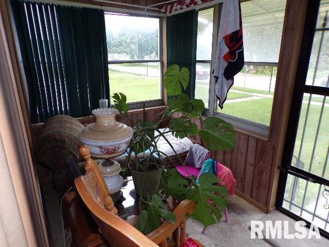 sunroom featuring a healthy amount of sunlight