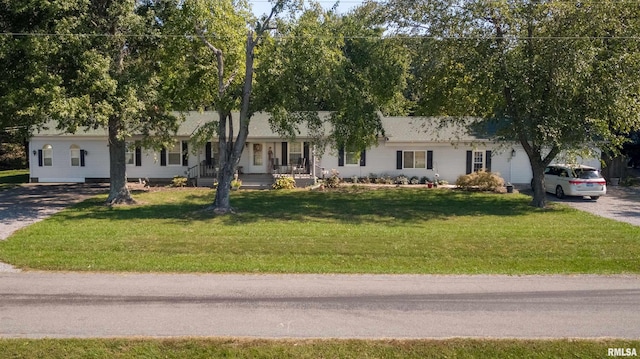 ranch-style house with a front yard