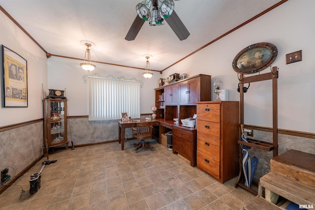 office area featuring ceiling fan and crown molding