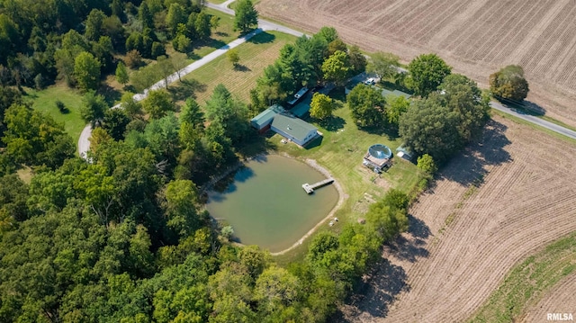 drone / aerial view with a water view and a rural view