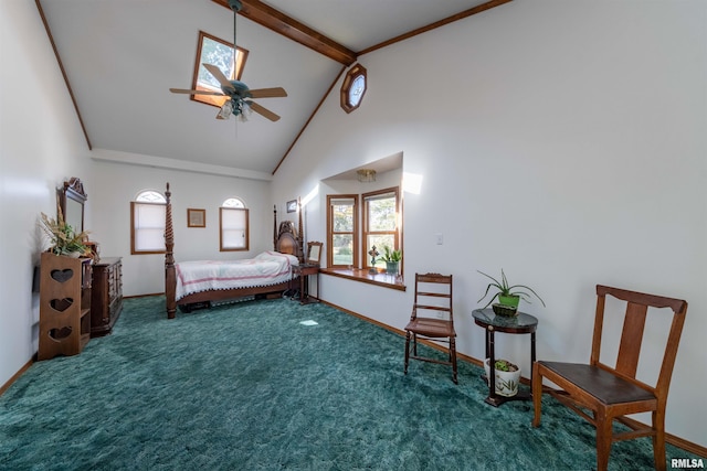 carpeted bedroom with high vaulted ceiling, beamed ceiling, crown molding, ceiling fan, and a skylight