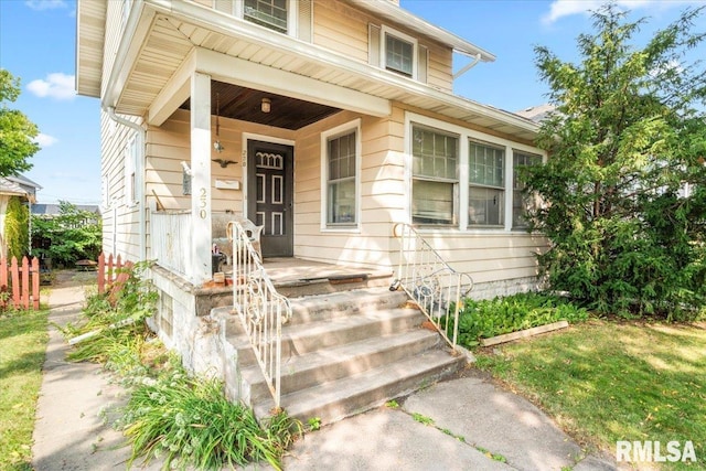 doorway to property with covered porch