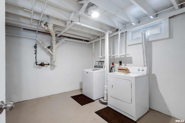 laundry room featuring washer and clothes dryer