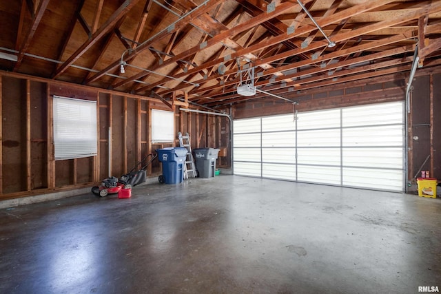 garage featuring a garage door opener