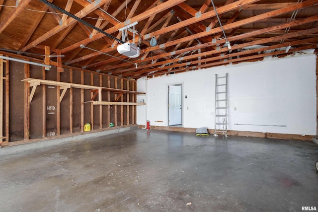 garage featuring a garage door opener