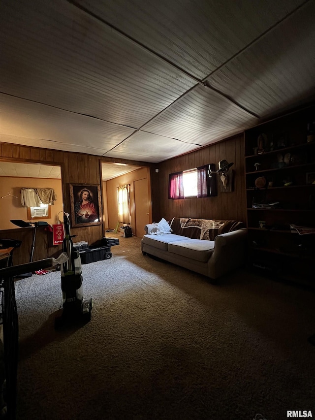 carpeted bedroom with wooden walls