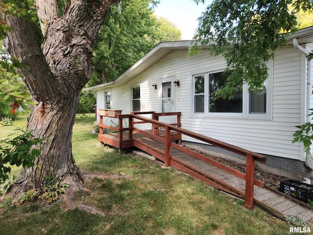 136 W 5th Ave, Woodhull, IL 61490 - wooden terrace with a yard