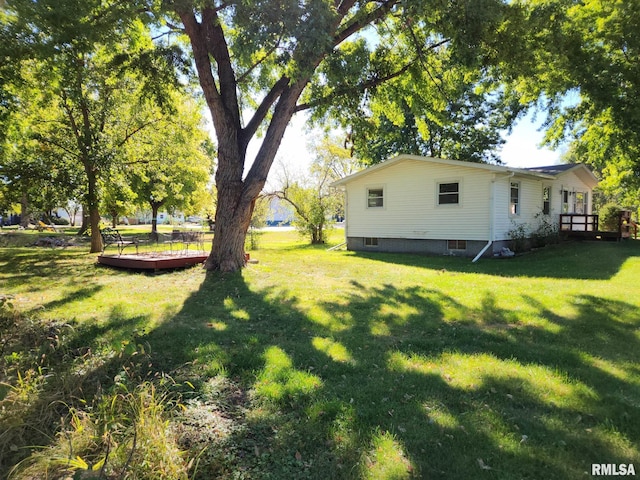 136 W 5th Ave, Woodhull, IL 61490 - view of grassy yard featuring a wooden deck