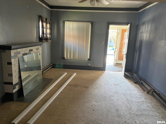 interior space featuring ceiling fan and ornamental molding