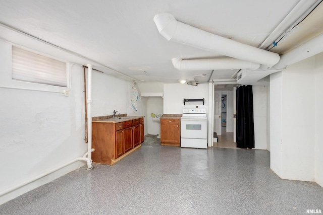 kitchen with white electric range oven and sink