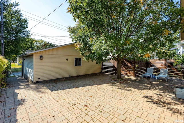 back of house featuring a patio