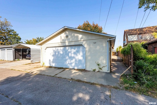 garage with a carport