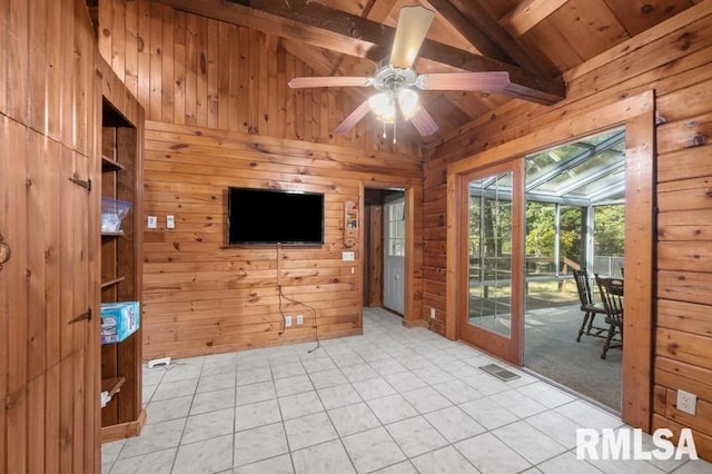 interior space featuring wood ceiling, light tile patterned flooring, vaulted ceiling with beams, and wood walls