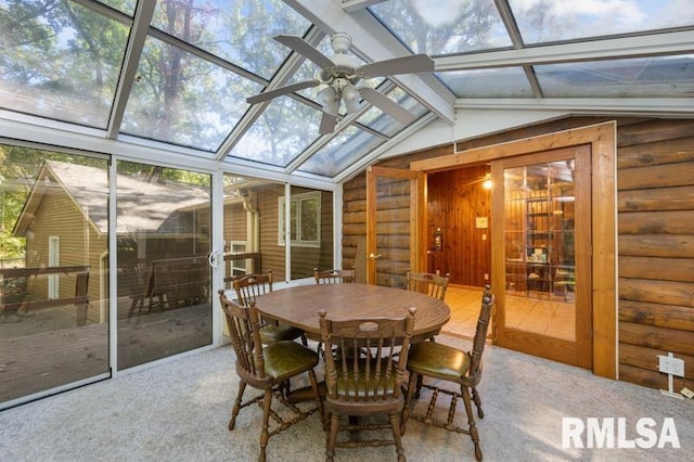 sunroom / solarium with vaulted ceiling and ceiling fan