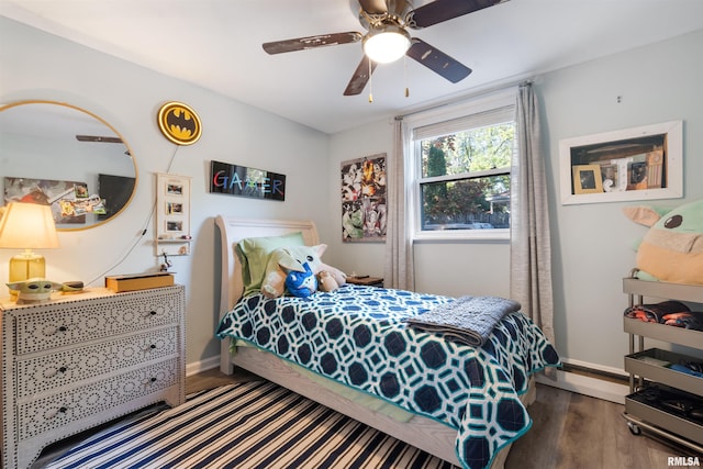 bedroom featuring wood-type flooring and ceiling fan