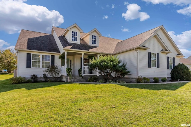 cape cod house with a porch and a front yard