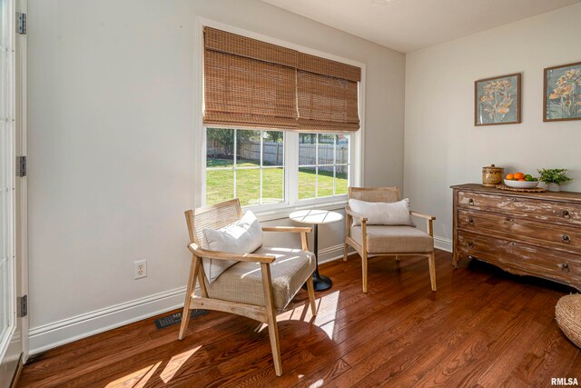 sitting room with hardwood / wood-style floors