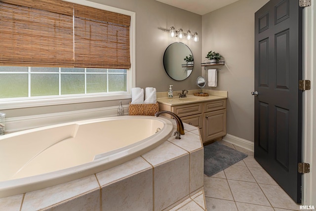 bathroom featuring vanity, tiled bath, and tile patterned floors