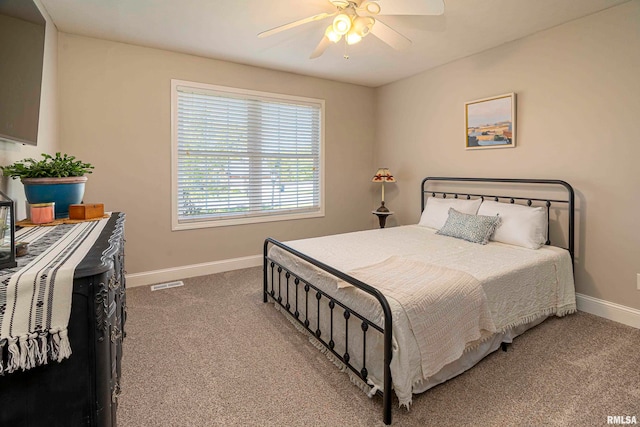 bedroom featuring ceiling fan and carpet floors