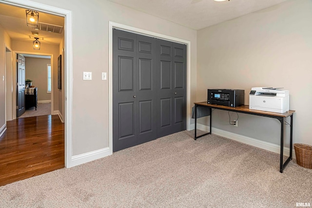 office with hardwood / wood-style floors