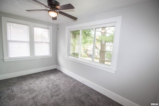 carpeted empty room with ceiling fan