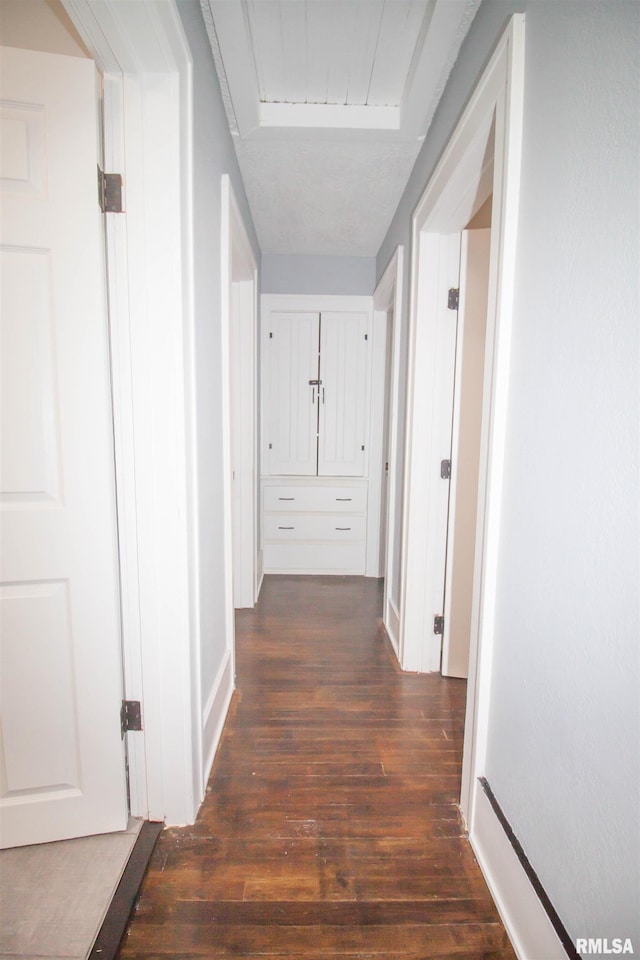 hall featuring dark hardwood / wood-style flooring