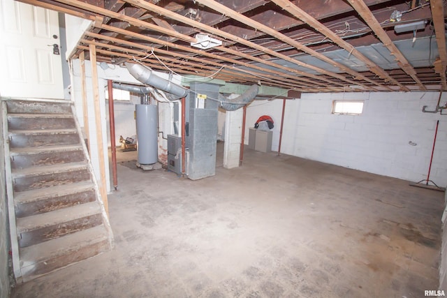 basement with heating unit and water heater