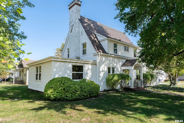 exterior space featuring a front lawn