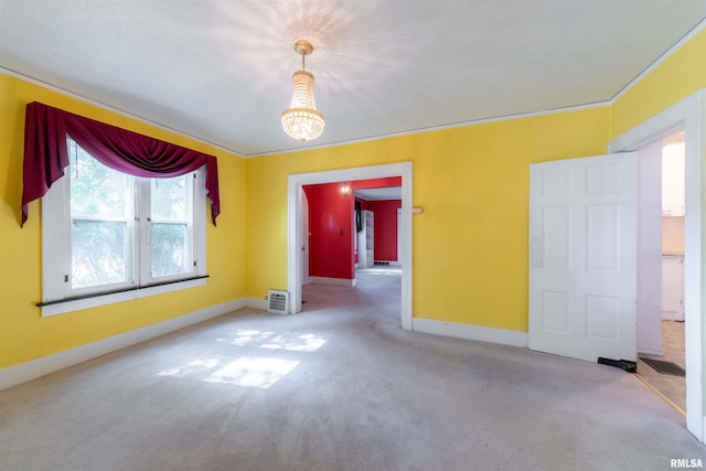 unfurnished room featuring carpet floors