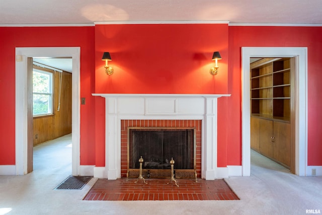 unfurnished living room with a fireplace and carpet floors