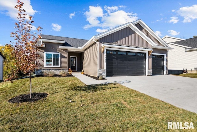 craftsman-style house with a front lawn and a garage