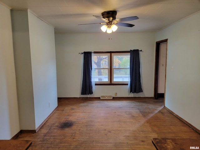 unfurnished room with ceiling fan, crown molding, and hardwood / wood-style flooring