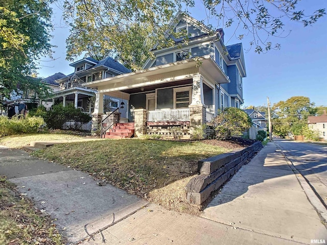 view of front of property featuring covered porch