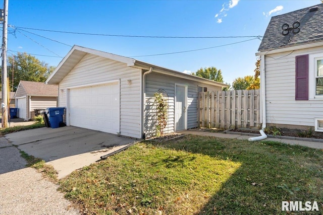 garage with a yard