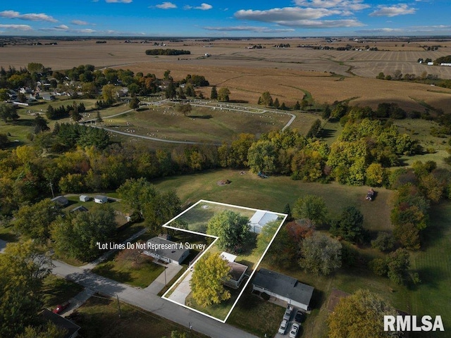 birds eye view of property with a rural view