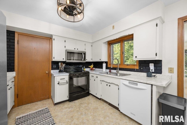 kitchen with black range with electric stovetop, backsplash, white cabinetry, dishwasher, and sink