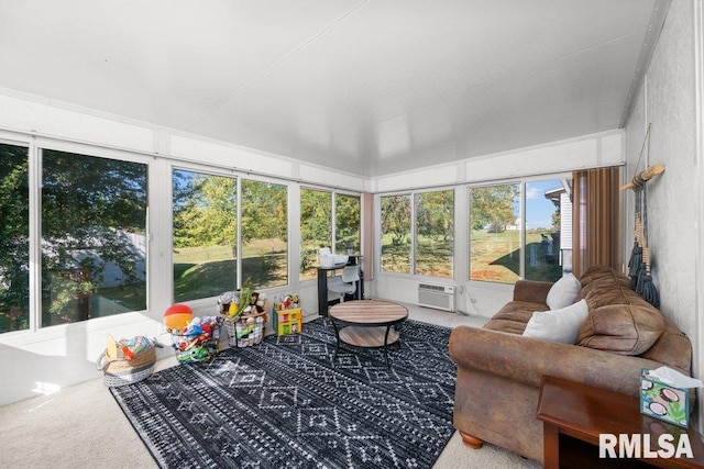 sunroom / solarium with an AC wall unit and vaulted ceiling