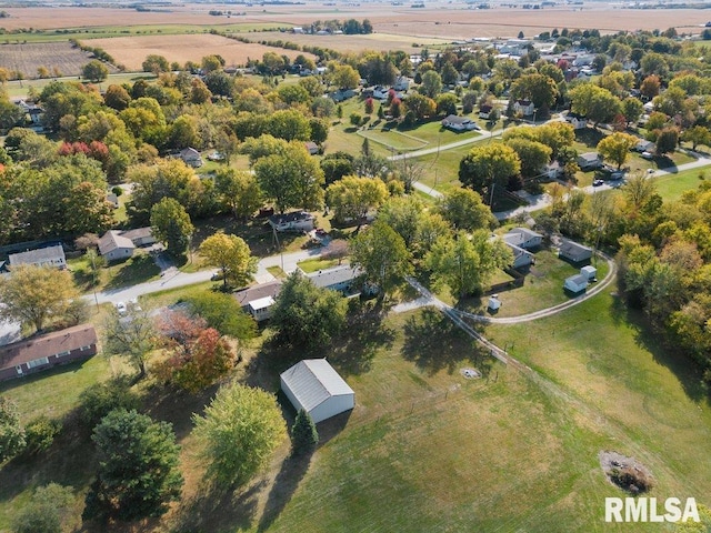 birds eye view of property featuring a rural view